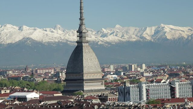 Views of the city of Turin surrounded by snow-capped mountains