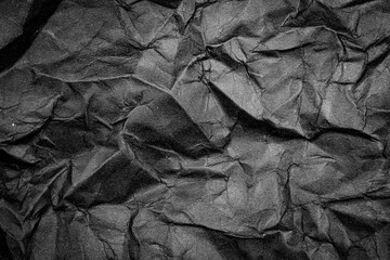 Black Paper Texture background. Crumpled Black paper abstract shape background.