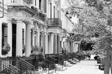 New York brownstone. Landmarks of NYC. Black and white retro filter photo.