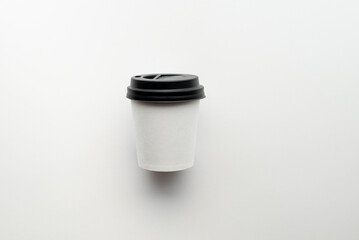 paper coffee cup with color background and Minimalistic concept