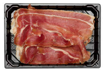 Thinly sliced jamon in a plastic container on an isolated background