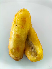 Pisang Goreng : Indonesian banana deep fried coated with batter. Selective focus.
