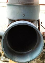 Selective focus. Storm drain - PVC pipe drain.
