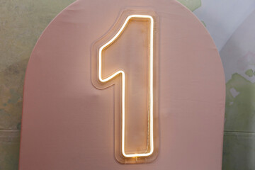 number 1 illuminated in celebration of one year anniversary