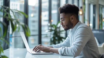 Serious African American Man, Studying, Cozy Autumn Cafe Ambiance