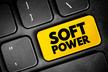 Soft power - ability to attract co-opt rather than coerce, text button on keyboard - 796661538