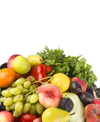 Set of vegetables and fruits isolated on a white. There is free space for text. Vertical photo.