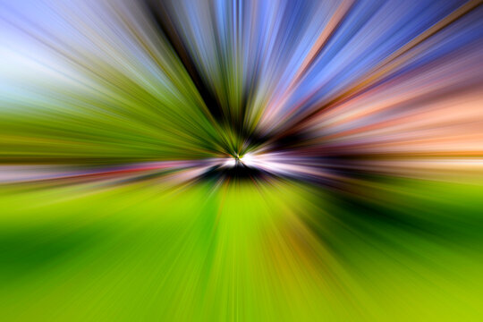 Abstract surface of blur radial zoom in green, blue and coral tones. Bright and juicy background with radial, diverging, converging lines.	

