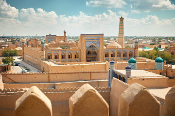 Madrasah and Kalta Minor minaret in ancient city at Khiva in Uzbekistan