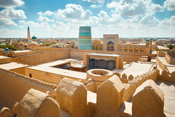 Madrasah and Kalta Minor minaret in ancient city at Khiva in Uzbekistan