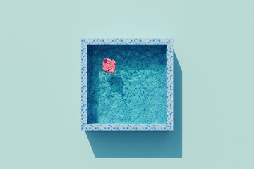 Flamingo floats in swimming pool. Summer swimming pool party. 3d render. Top view - 796692172