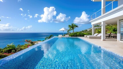 Fototapeta premium A large pool with a white umbrella and a view of the ocean