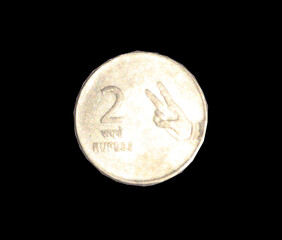 Top view of 2 rupee Indian coin. Tail side of two rupee Indian coin on black background 