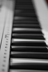 piano keys close up and blurred background