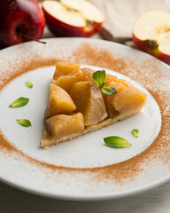 Tarte Tatin is a variant of apple pie in which the apples have been caramelized in butter and sugar before adding the dough.