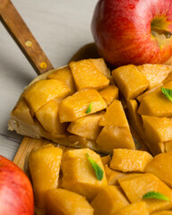 Tarte Tatin is a variant of apple pie in which the apples have been caramelized in butter and sugar before adding the dough.