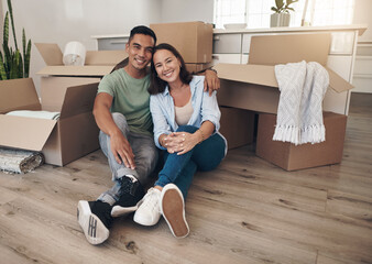 Portrait, couple and happy in new home with boxes for moving in, satisfied and confident with...