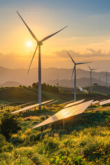 A serene landscape with wind turbines and solar panels, representing the types of renewable energy projects funded by individual carbon offset subscriptions