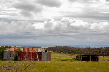 Rusty corrugated iron shed in the countryside, Victoria, Australia