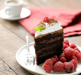 chocolate cake with whipped cream and berries