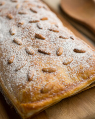 Chocolate San Juan Coca. Traditional San Juan cake to celebrate the arrival of summer in Spain made with puff pastry and cocoa cream.