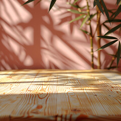 wooden table with bamboo leaves casting shadows on a pink wall.