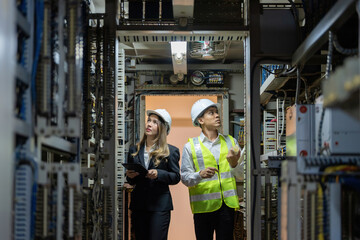 Within the energy industry's intricate web, power plants stand as bastions of innovation, where male and female engineers collaborate to propel the sector forward.