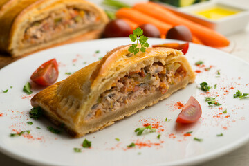 Traditional Galician empanada filled with vegetables and anchovies. Traditional recipe from the...