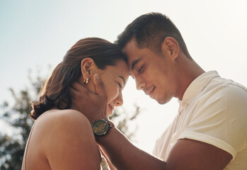 Couple, embrace and love on holiday at sunset with support, care and trust in marriage or vacation...