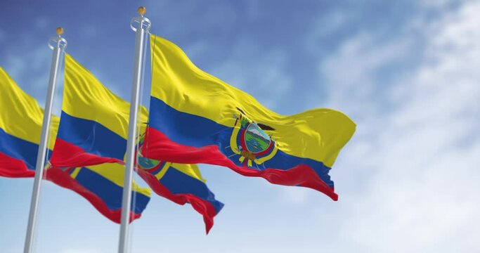 Ecuador national flags waving in the wind on a clear day
