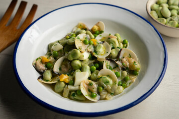 Beans with peas and clams. Traditional tapa from northern Spain.