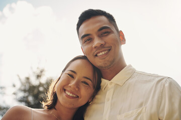 Couple, portrait and embrace with love at sunset with support, care and trust in marriage or...