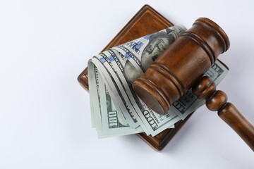 Judge's gavel and money on white background, top view. Space for text