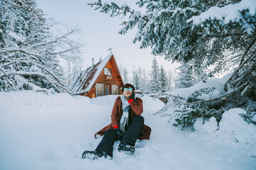 young man playing in the snow In the cold season in Alaska, America