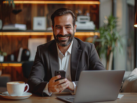 A happy, bearded businessman in formal attire video chatting on his phone at his sleek workspace with a coffee cup and laptop --ar 4:3 --stylize 200 Job ID: f083fca4-3dc7-4c8c-aae0-ce51f0c0624b