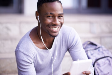 Student, black man and portrait in city with tablet for information on university schedule or classes. Pupil, digital tech and internet with music on college steps, happy and online academic journal.