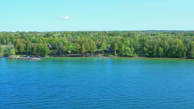 Luxury day vacation aerial view, surrounded by the natural beauty of Lake Manitou. Haven allure of recreational bliss, panoramic views of shoreline of Manitoulin Island, aquatic adventures in paradise