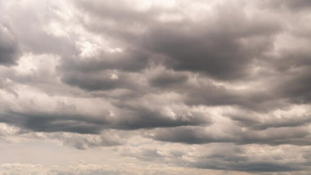 Clouds time lapse. Blue sky with fast morphing clouds moving at summer sunny day. Sky timelapse. 4K cloudscape. Nature footage clean of birds, bugs, and dust.