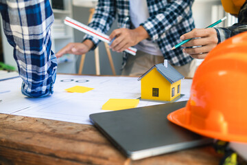 Architects and designers are talking about Construction plans before being delivered to the...