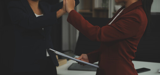 Business handshake for teamwork of business merger and acquisition,successful negotiate,hand shake,two businessman shake hand with partner to celebration partnership and business deal concept