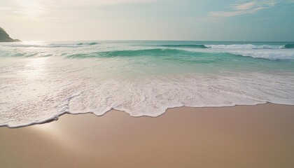 Obraz premium beautiful sandy beach and soft blue ocean wave