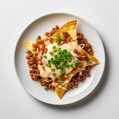 Chili cheese nachosr in white oval plate food vegetable breakfast.