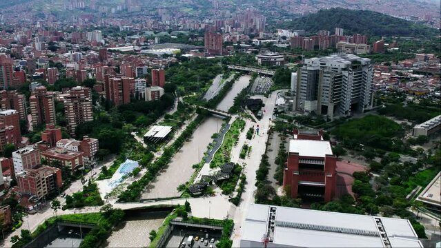 Traffic on highway next to the Medellin river.
