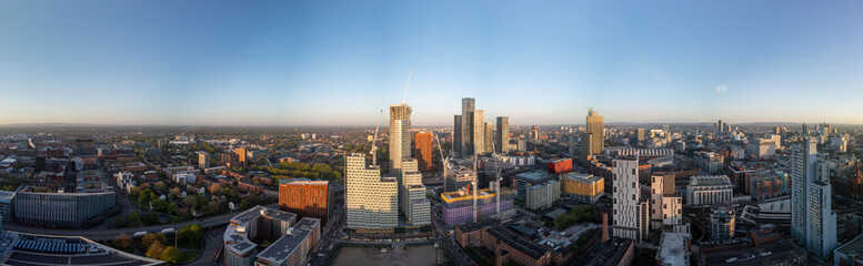 Panoramic Manchester skyline during golden hour