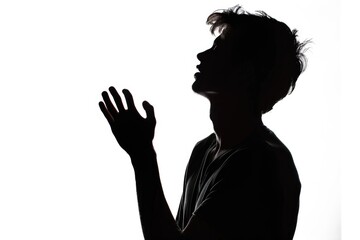 Silhouette of young man portrait in shirt with hand on studio isolated white background. Close up.