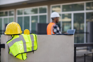 Yellow safety helmet are provided along with reflective vests for workers wear because Yellow safety helmets protect against falling objects during construction and reflective vests provide visibility