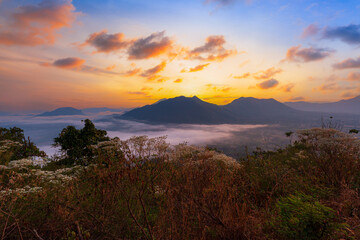 Phu Thok Chiang Khan scenery, Thailand,Sea of Mist with Light of the morning above Mountains from viewpoint at Phu Thok, Chiang Khan, Loei, Thailand.