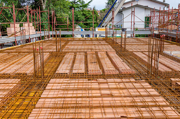 reinforced concrete floor and steel reinforcement of building in construction site civil house