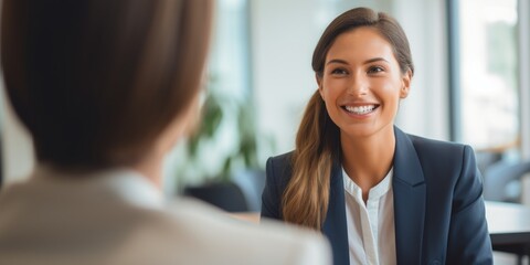 Businesswoman taking interview of a job applicant. Generative AI.