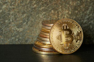 Closeup of bitcoin cryptocurrency with blurred background and copy space